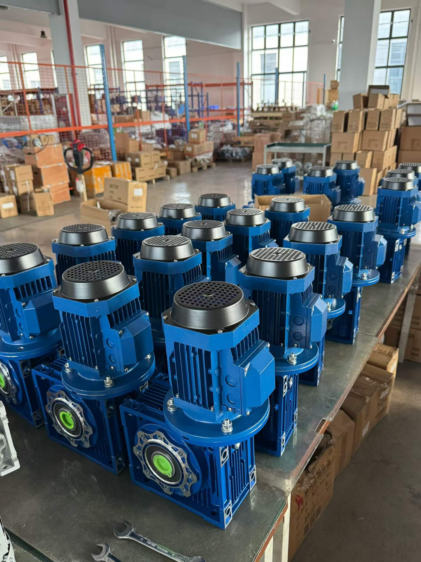 Batch of blue SMK NMRV worm geared motors prepared in the factory