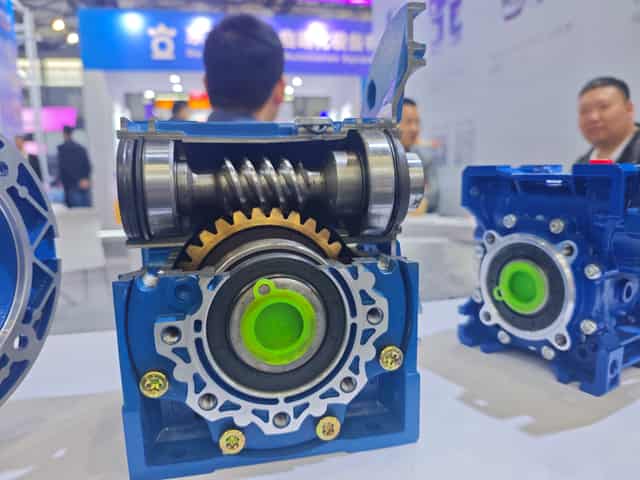 Cutaway view of an SMK NMRV worm gearbox showing the steel worm and bronze worm wheel