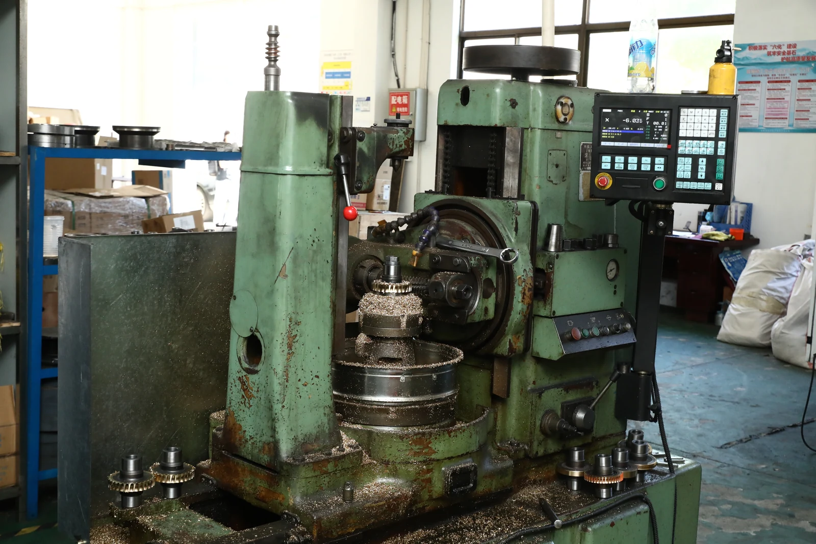 Worm gear machining equipment operating inside the SMK Transmission factory in Jiangsu, China